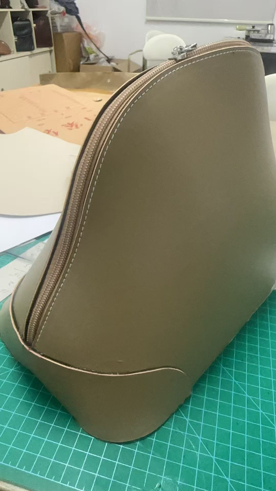Leather bags on the worktable in our Guangzhou sample room